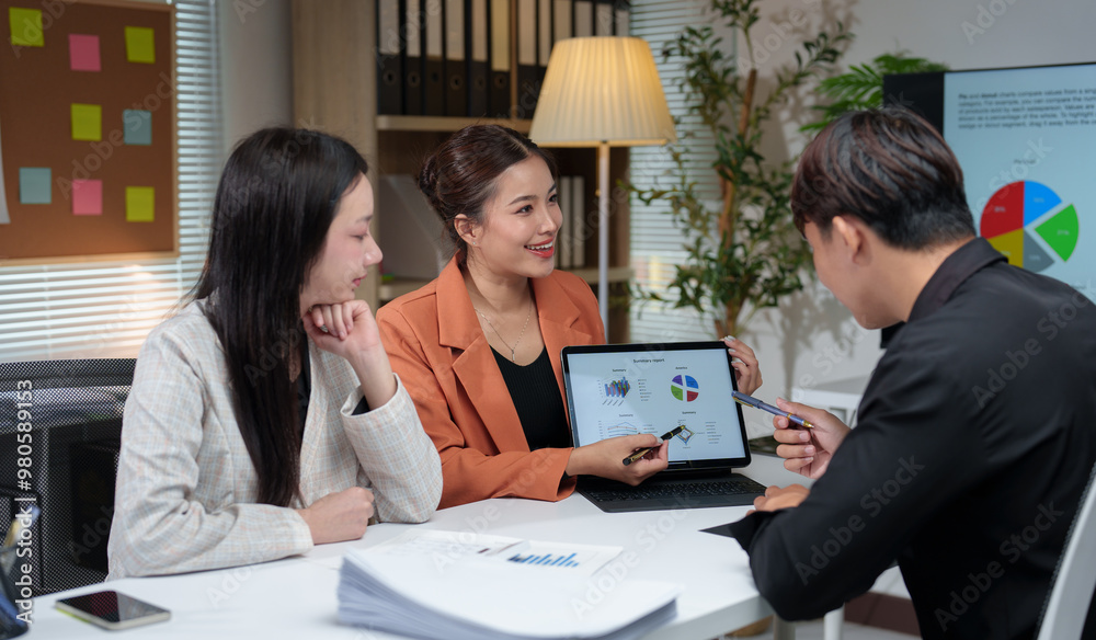 Fototapeta premium Business team giving advice Meeting and brainstorming, financial investment, real estate project, strategy, planning, calculation, pointing at graph chart on desk at office.