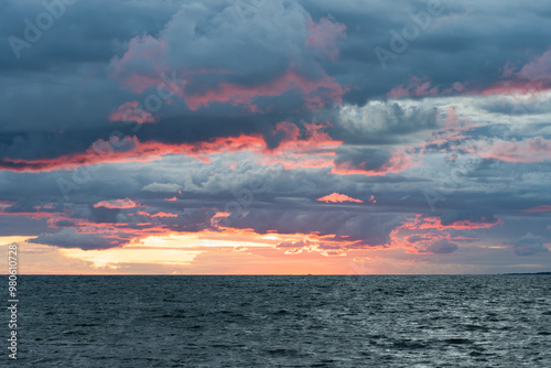 The nature of Estonia, stormy clouds in the Baltic Sea on a summer evening during sunset.