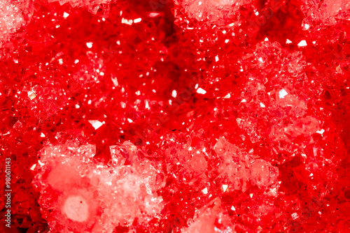 Amethyst red crystals. Gems. Mineral crystals in the natural environment. Texture of precious and semiprecious stones. Seamless background with copy space colored shiny surface of precious stones.