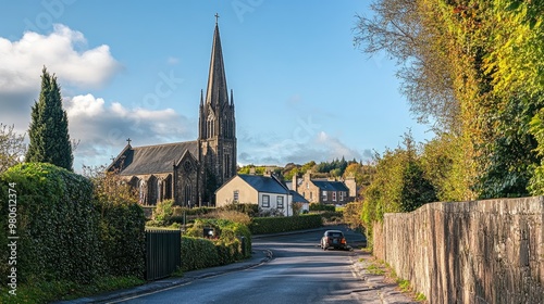 A picturesque view of the Cathedral Church of the Holy and Undivided Trinity in Downpatrick, Northern Ireland, with its towering spire. photo