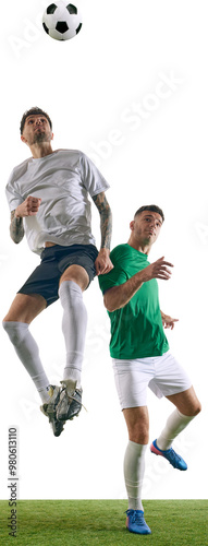 Obraz na płótnie Two athletic men, soccer players in mid-air compete for ball on green lash playground against transparent background