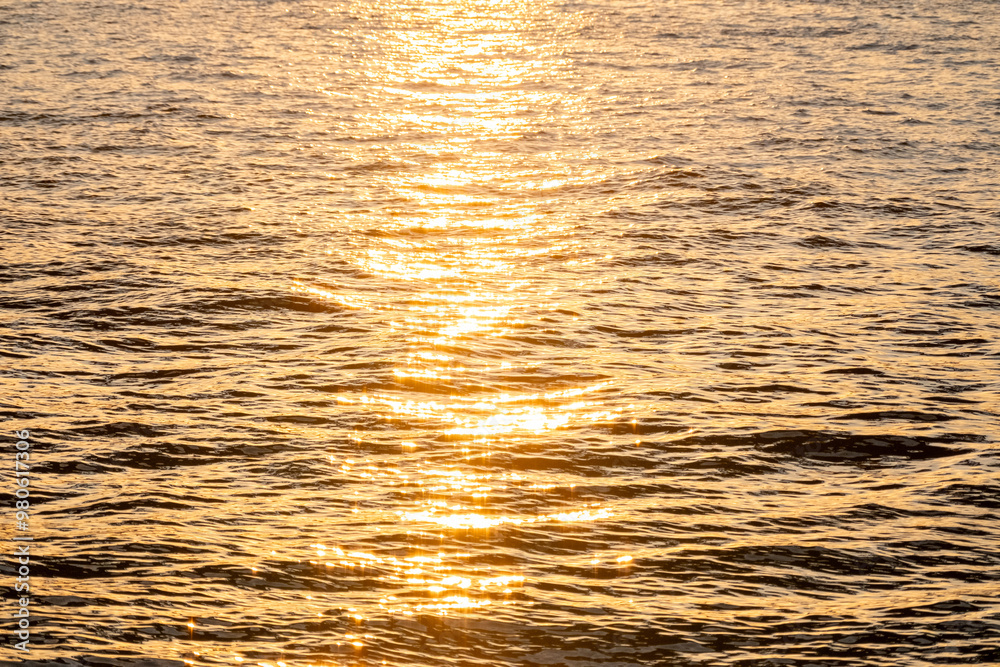 golden sunset sun rays reflected in sea waves golden sunset sun rays reflected in sea waves