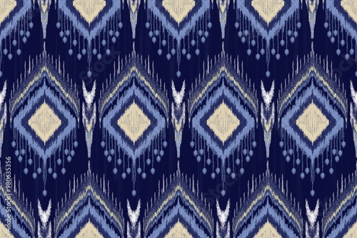 Ethnic Ikat tropical seamless pattern blue tone. Abstract traditional folk antique graphic fabric line. tribal embroidery stitch ikat repeat pattern, clothing, tropical pattern, American pattern