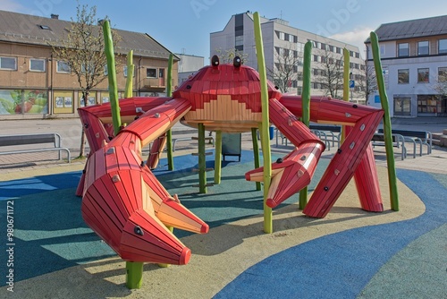 Children´s crab climbing frame at children´s playground which is situated in open square in the center of town, Kirkenes, Norway. photo