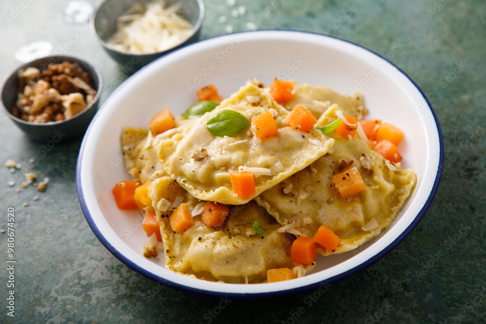 Homemade pumpkin ravioli with herbs and cheese Homemade pumpkin ravioli with herbs and cheese