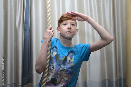 A boy on a tightrope. physical development