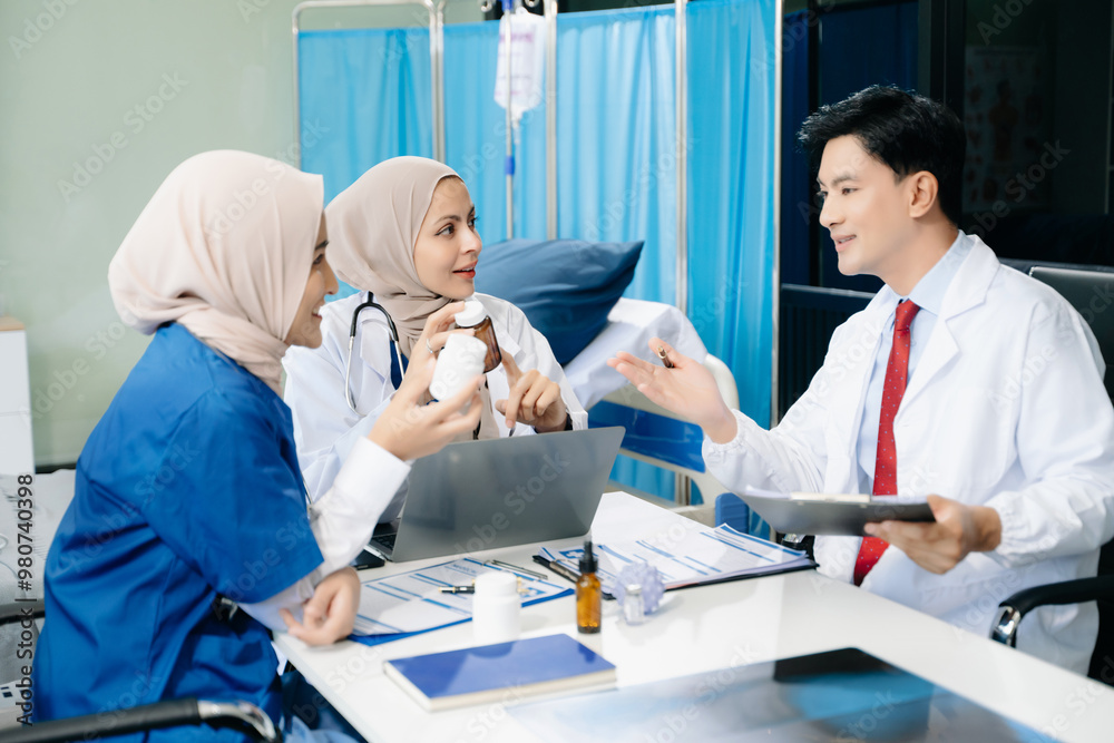 Obraz premium Doctors and nurses working together in a hospital ward, showcasing professionalism, teamwork