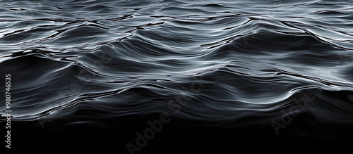 Image featuring black water surface with waving ripples providing copy space image