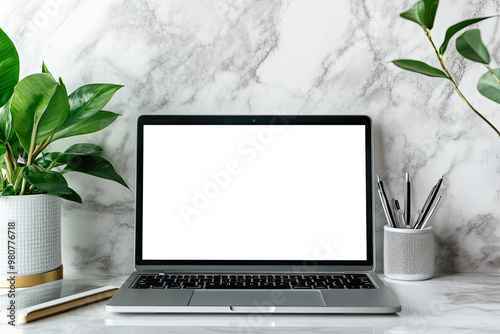 Photo of a laptop with a blank screen on a marble desk, surrounded by office supplies and plants. Created with Ai
