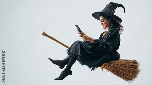 a witch looking at her smartphone