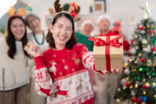 The family's gift-giving activity during Christmas at home