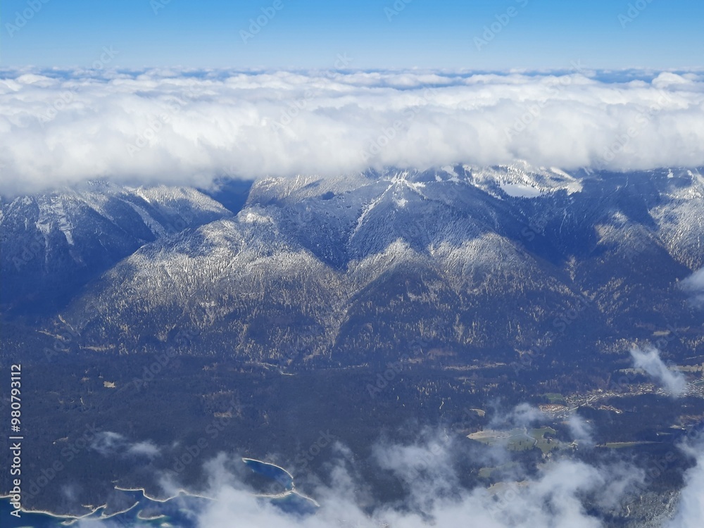 Obraz premium Snow covered mountain top in Austria. View of the Alps from the Zugspitze, the highest mountain in Germany