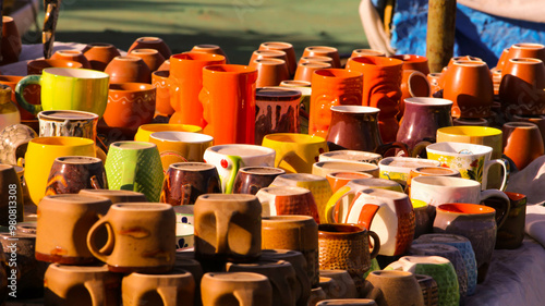Traditional Indian handmade Items of Earthenware Or Ceramic at a Vendor Stall,decorative  Sculpture  Made with Earthen Mud, handcrafted traditional clay decoration toy in indian market
