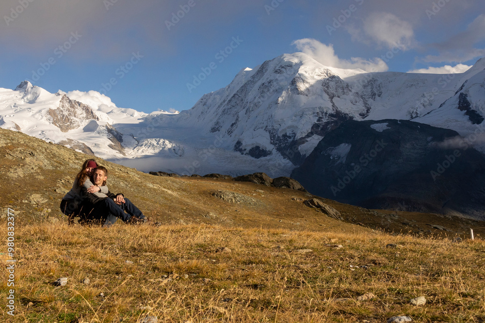 Couple embracing in mountain landscape Couple embracing in mountain landscape