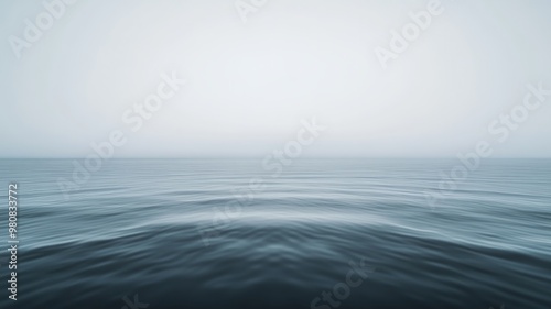 Calm Sea Under a Misty Sky