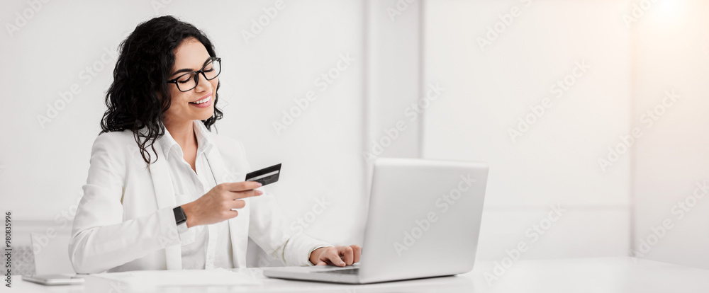 Easy Payment. Happy brazilian businesswoman working and buying online with credit card and laptop. Free space Easy Payment. Happy brazilian businesswoman working and buying online with credit card and laptop. Free space