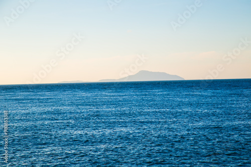 Turquoise sea wave wallpaper sun light reflection nature background