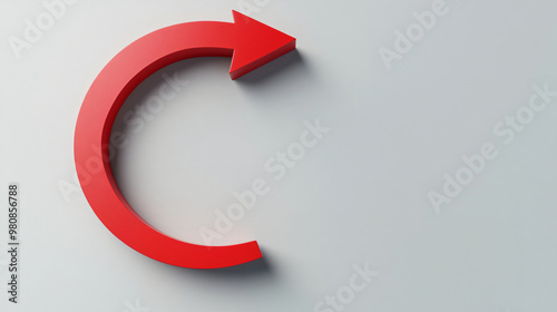 Red 3d arrow curved and pointing right on a clean white background, symbolizing a change of direction or cyclical movement photo