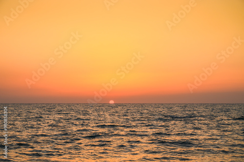 reflections of the setting sun in the Mediterranean sea