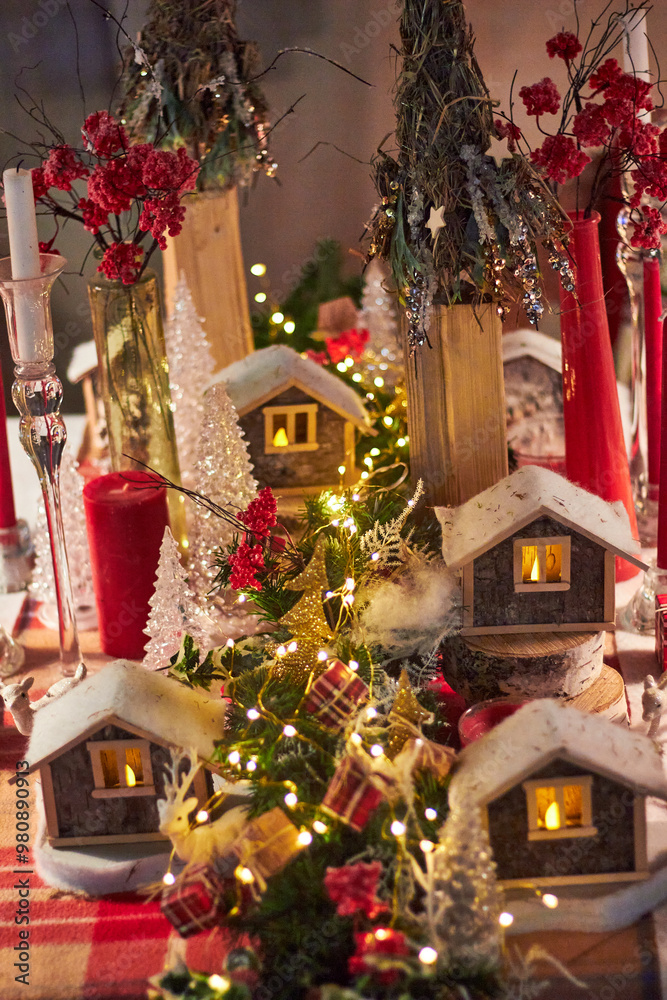 Fototapeta premium Christmas table setting indoors Christmas decoration in classic red and gold color scheme