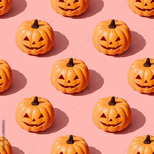 Pattern of Halloween pumpkins on a pink background