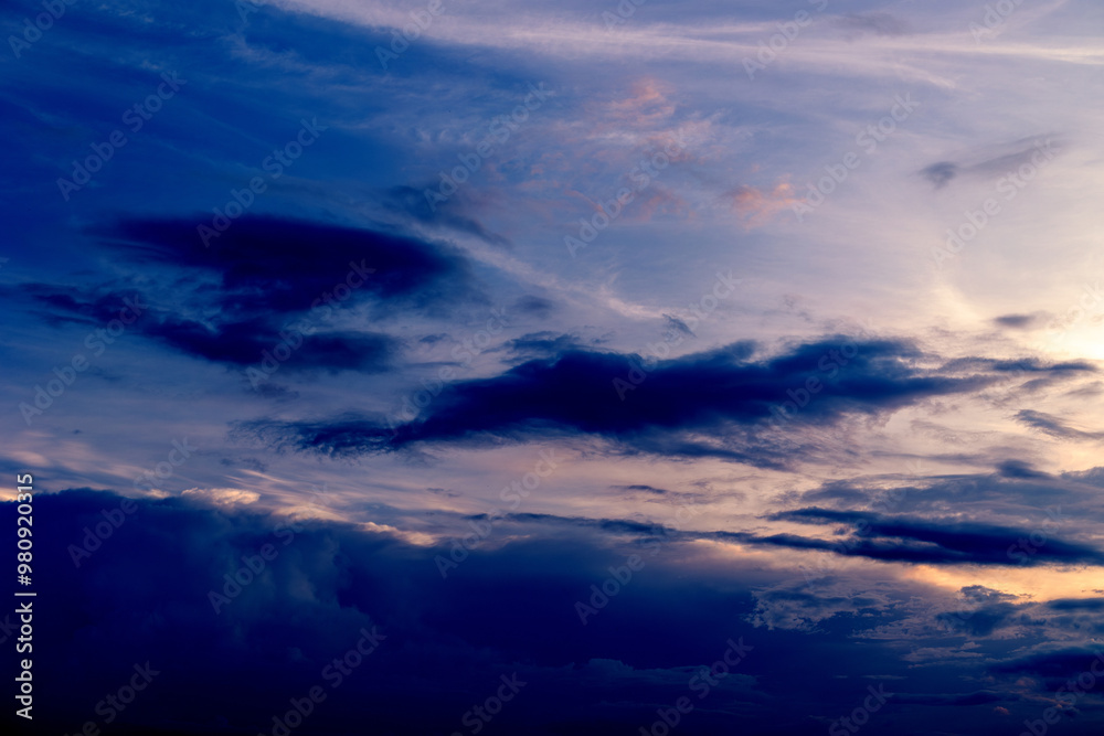 Obraz premium Beautiful sunset cloudy blue sky