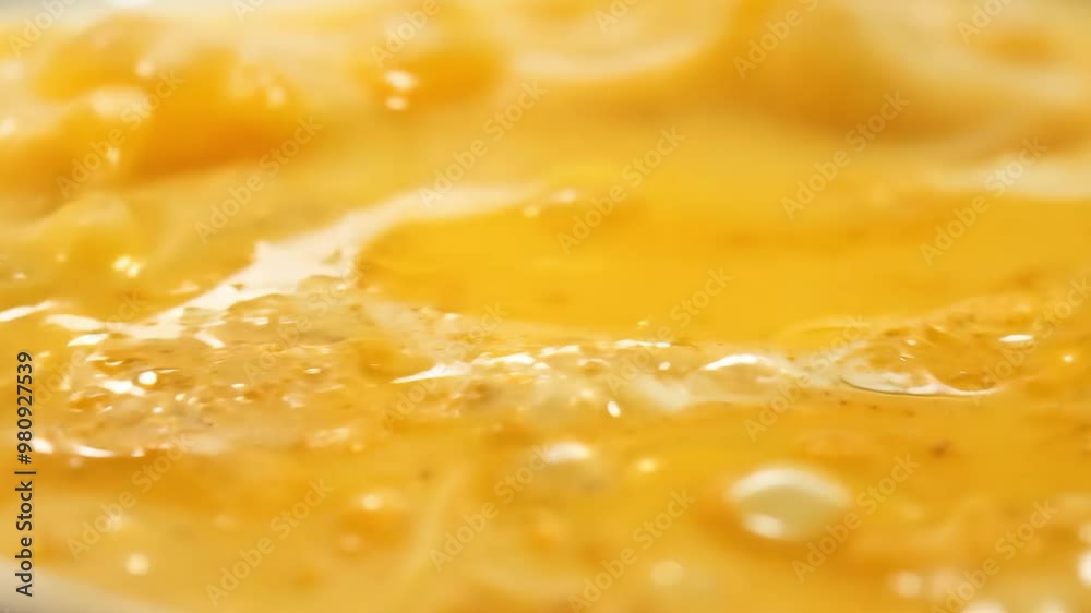 Close-up of bubbling golden cheese sauce texture Close-up of bubbling golden cheese sauce texture