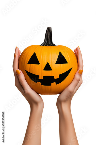 Hands holding a carved Halloween pumpkin