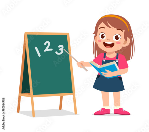 little kid writing on blackboard with chalk to study