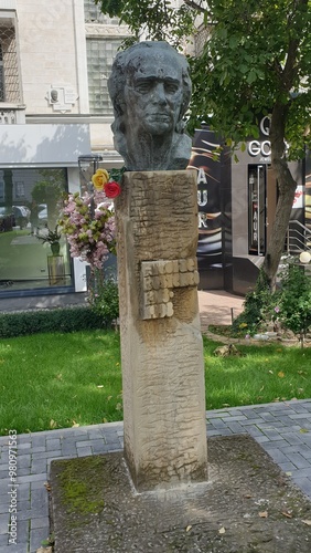 Moldova, Chisinau, capital, rain, puddle, gate, street, monument, building, architecture, antiquity, door, restoration, trees, leaves, autumn, flowerbed, flowers, berries, porch, steps, columns