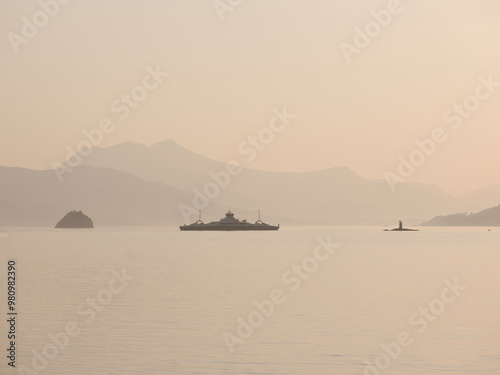 Ferry in sunset