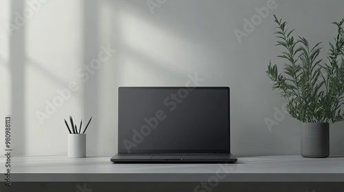 Wallpaper Mural A modern laptop with a closed lid, resting on a minimalist desk Torontodigital.ca