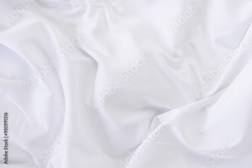 White fabric. luxurious white fabric texture background. Creases of satin, silk and cotton