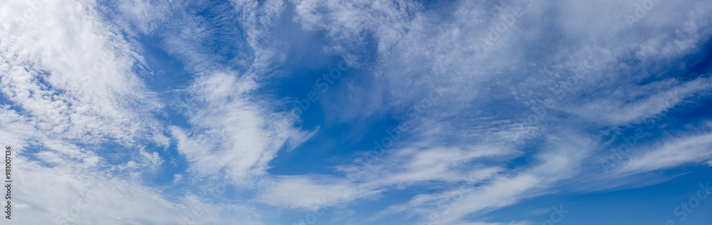 Panoramic cloudscape with blue sky with white light airy clouds Panoramic cloudscape with blue sky with white light airy clouds