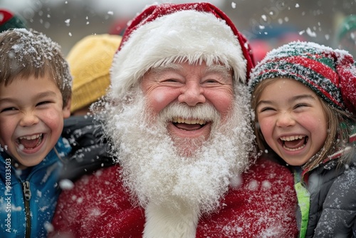 Santa Claus, the embodiment of holiday cheer, is pictured here delighting children with his jolly presence as they experience a winter wonderland together.