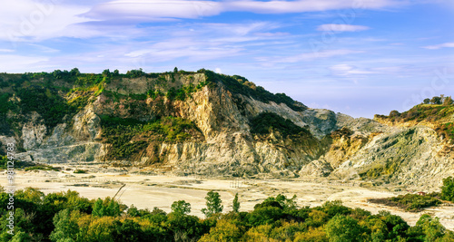 landscape of Plegrean volcano fields in Naples Italy near Pompeii with sulfur yellow caldera duribg eruption of smoke. campi Flegrei and cataclysm of Earthquake photo