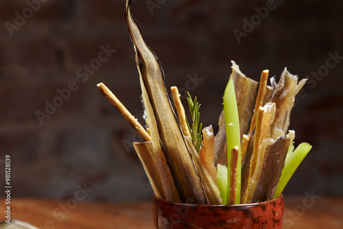 salted breadsticks on the table photo