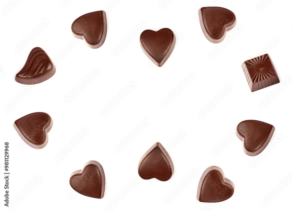 Chocolate candies isolated on white. Collage. Free space for text. Chocolate candies isolated on white. Collage. Free space for text.