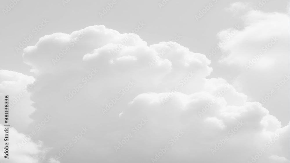 Obraz premium White Clouds from above. Aerial view of the fluffy white cloud on blue sky. Top view from an airplane over white clouds