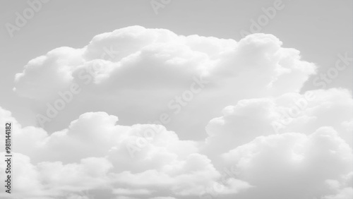 White Clouds from above. Aerial view of the fluffy white cloud on blue sky. Top view from an airplane over white clouds