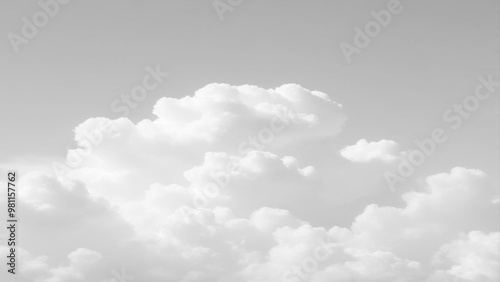 White Clouds from above. Aerial view of the fluffy white cloud on blue sky. Top view from an airplane over white clouds