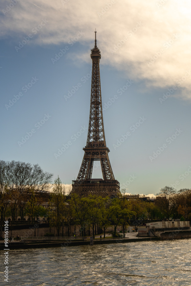 Paris Eiffel Tower and river Seine at sunset in Paris, France. Eiffel Tower is one of the most iconic landmarks of Paris Paris Eiffel Tower and river Seine at sunset in Paris, France. Eiffel Tower is one of the most iconic landmarks of Paris
