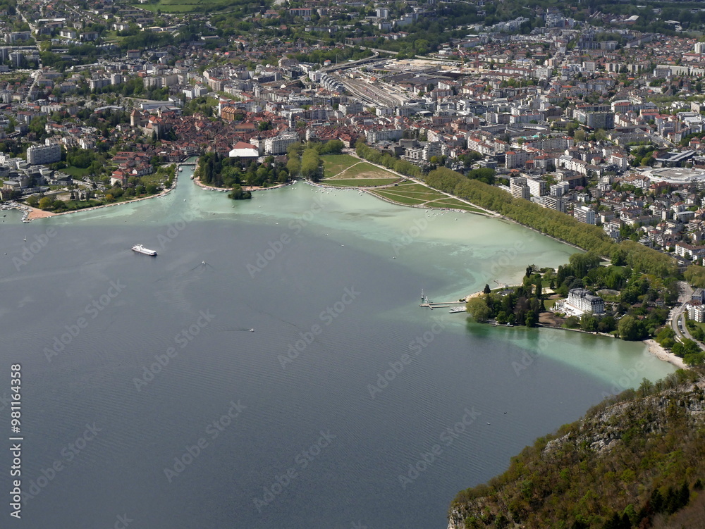 Aerial view of Annecy old town and lake shore in Haute savoie, France. High angle view of the city Aerial view of Annecy old town and lake shore in Haute savoie, France. High angle view of the city