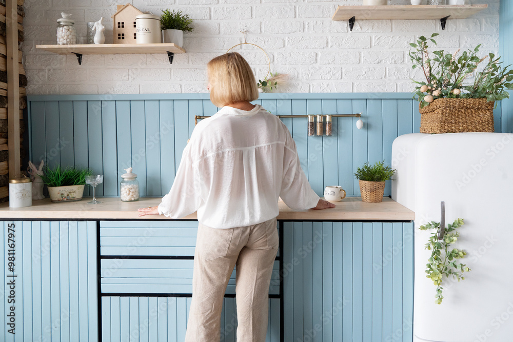 Healthy Lifestyle A Woman Delightfully Enjoying her life a Modern and Stylish Kitchen Healthy Lifestyle A Woman Delightfully Enjoying her life a Modern and Stylish Kitchen