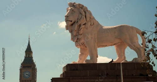 Big Ben, Houses of Parliament and the Lion Statue on Westminster Bridge, London, England