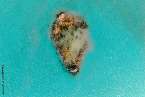 rubbish dump from above, Unusual island, garbage island, polluted world, amazing island from a bird's eye view, green island with turquoise water, unusual view of the island, beautiful island