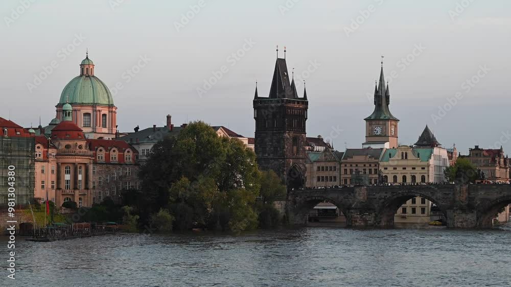 Iconic Charles Bridge over Vltava river and Prague Old town cityscape at sunset, in Prague, Czech Republic Iconic Charles Bridge over Vltava river and Prague Old town cityscape at sunset, in Prague, Czech Republic