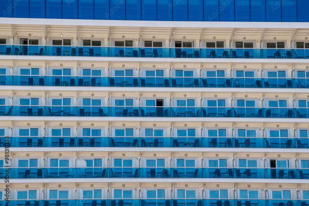 Detail of the facade of a luxury cruise ship. Blue windows. Detail of the facade of a luxury cruise ship. Blue windows.