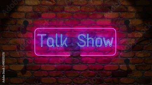 Talk show with glowing neon sign with blue and pink lights, mounted on a rustic brick wall, creating a vibrant and modern atmosphere photo