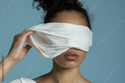 Blindfolded Woman Representing Misinformation and Deception inDistorted Reality